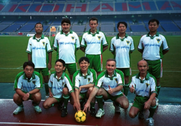The World Media Stars, a team of foreign correspondents in Japan, at the International Stadium Yokohama (October 2000)